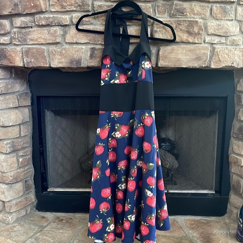 NWOT blue dress with strawberries throughout. Side zipper & elastic back. Small